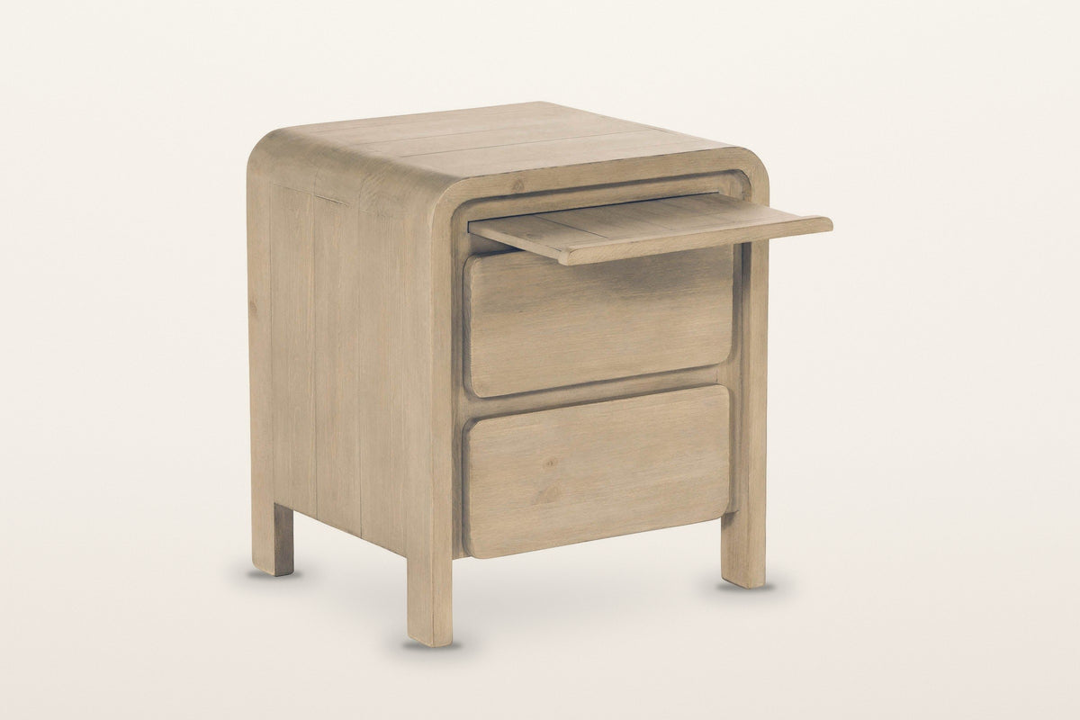 Scheggino nightstand on a warm white studio backdrop with its slim tray pulled out above the two drawers