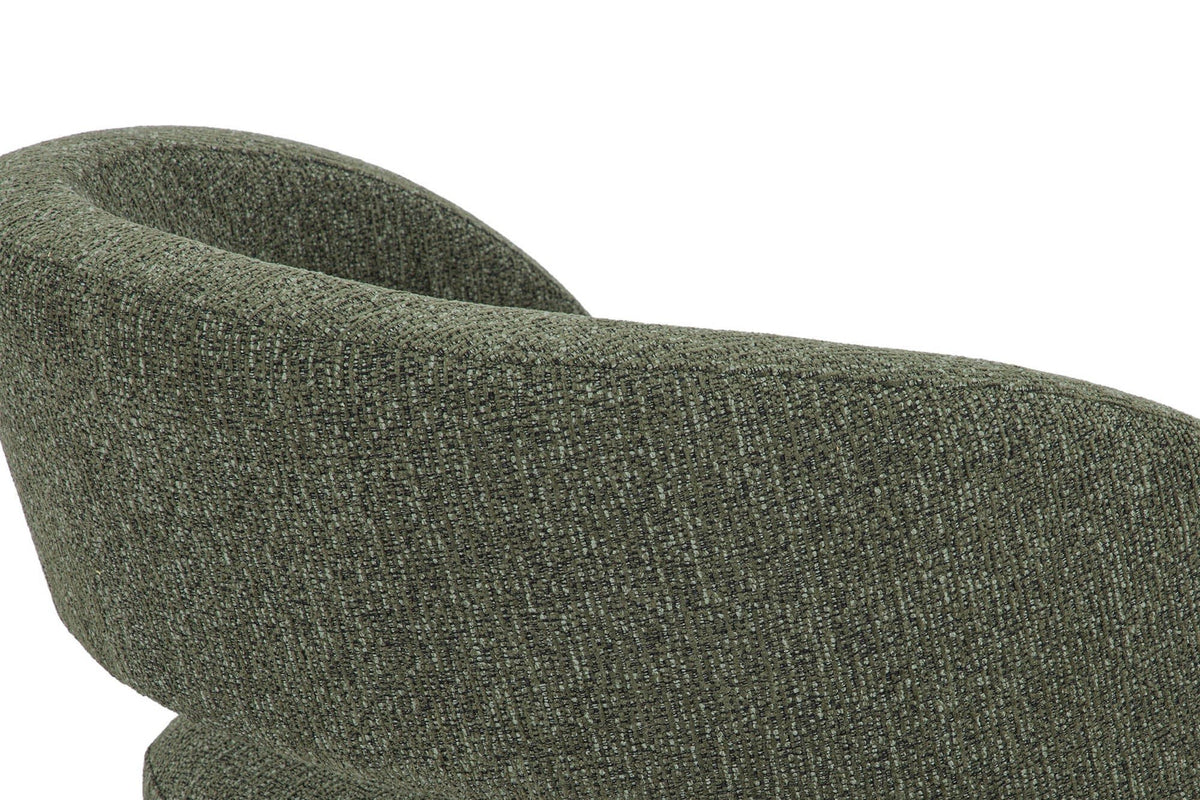 Close-up from above and behind: the Sefro back band curving over the seat block, in Green
