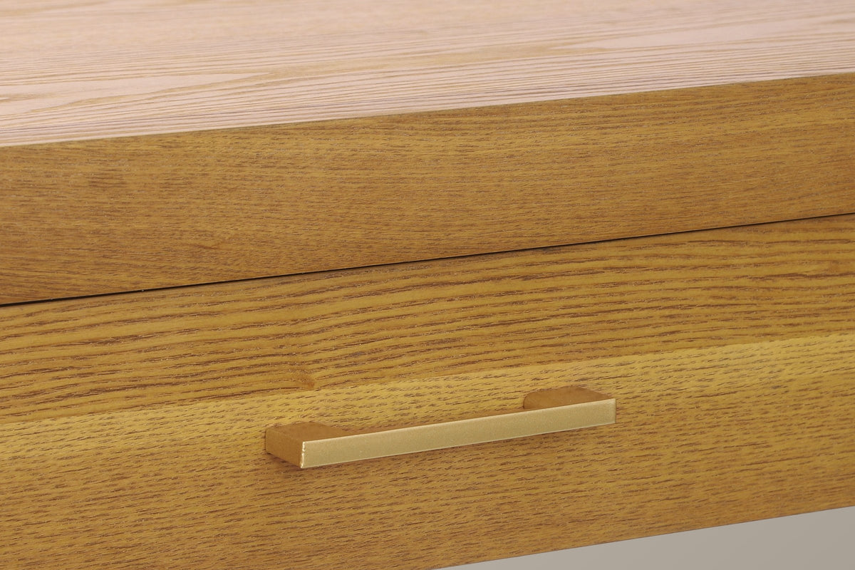 Close-up of a Natural honey-tone drawer front with its gold-tone bar pull under the thick top edge
