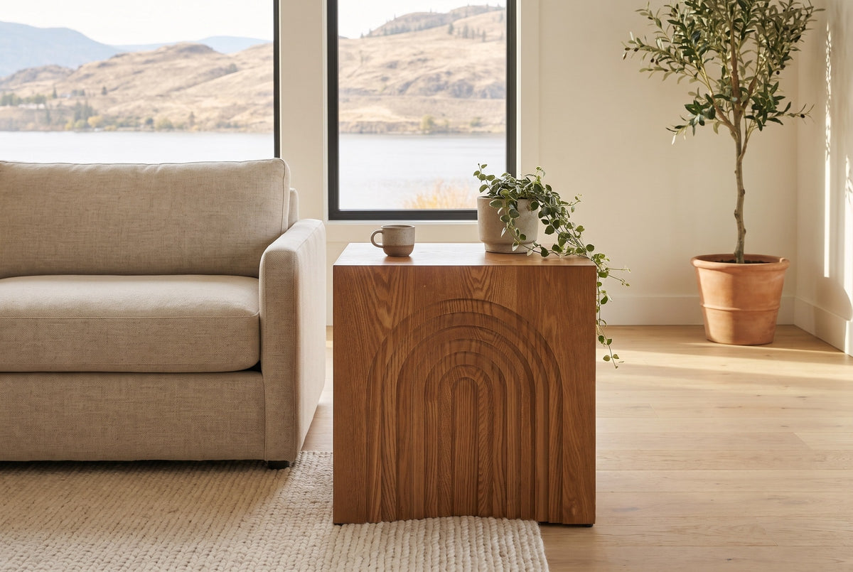 Sondrio side table beside a linen sofa in a bright Kelowna lake house living room