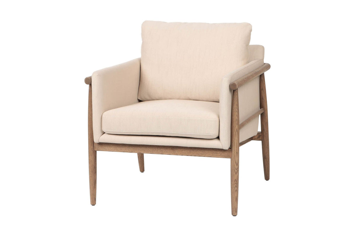 Soren ash wood accent chair with beige fabric cushions, three-quarter view