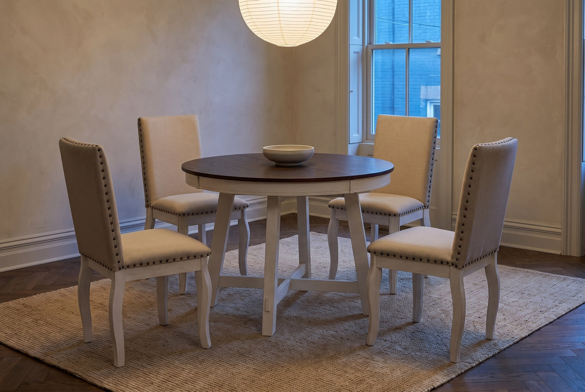 Spilamberto set in a Toronto townhouse dining room at dusk, a paper pendant glowing above the table