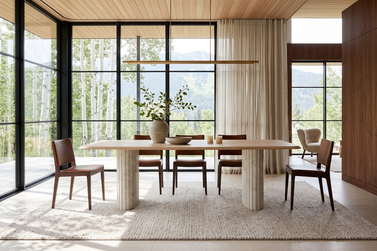 Staffolo dining table in Natural in a Whistler mountain house with walnut panelling
