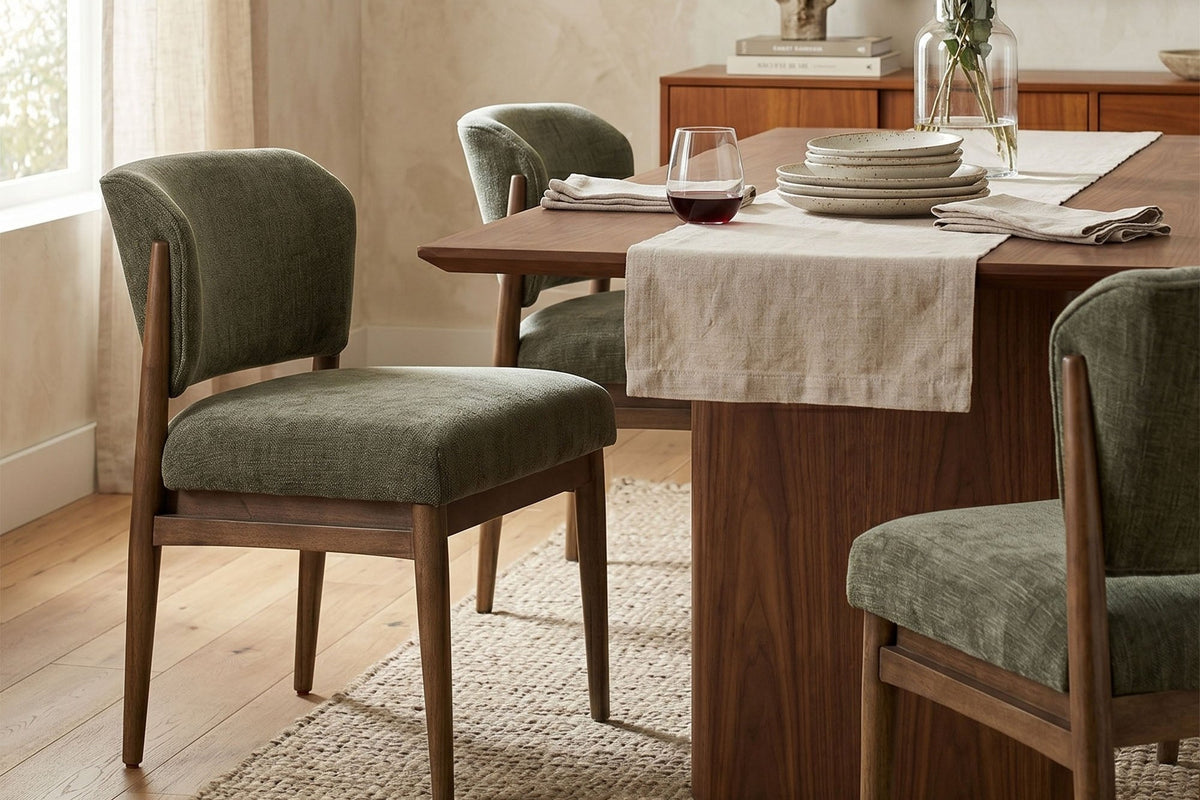 Sutton olive chenille dining chairs around a wood dining table