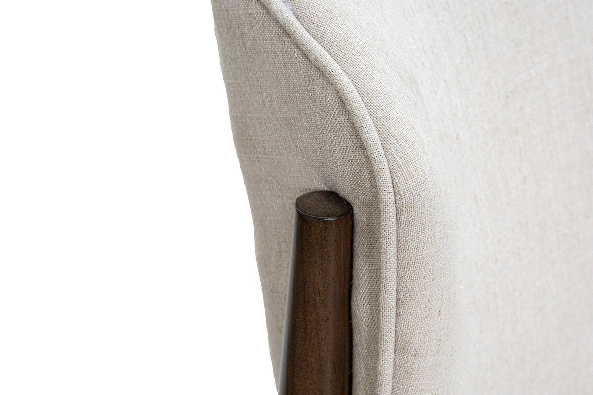 Sutton linen taupe close-up of the curved back edge and wooden rear post