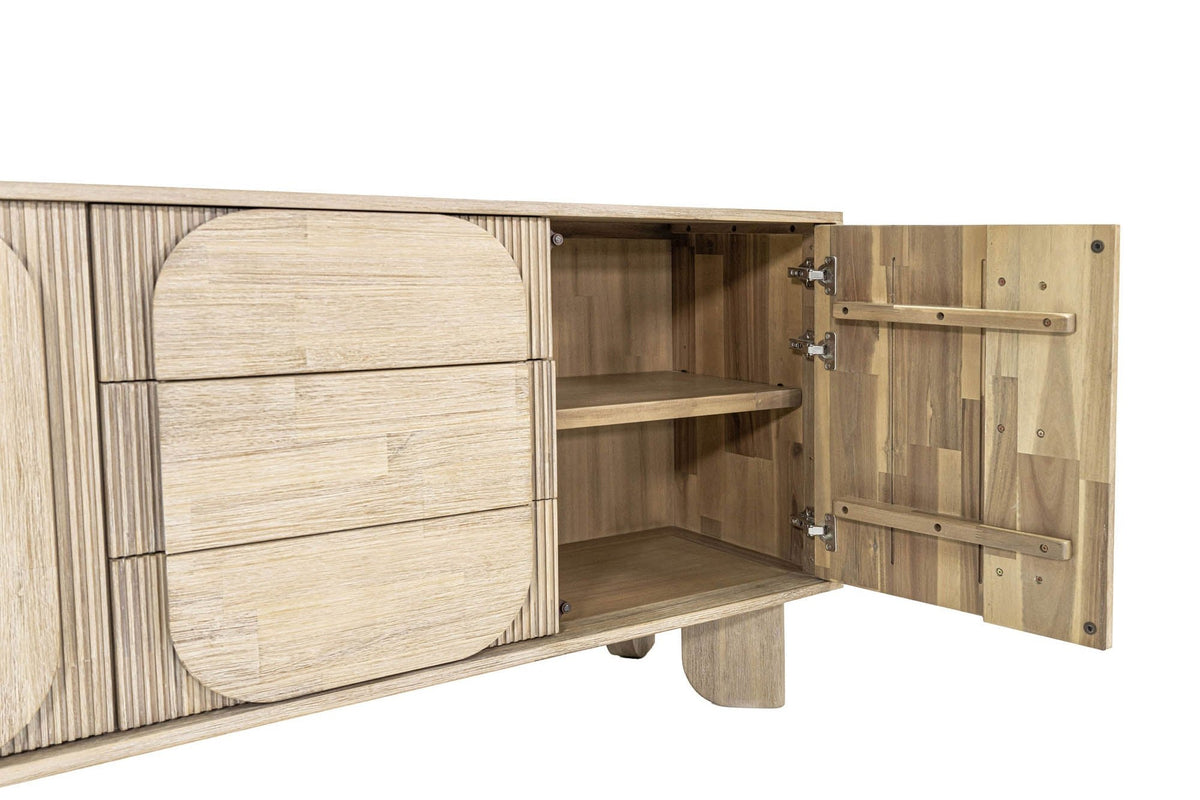 Sylvan cabinet door open on soft-closing hinges, showing the interior shelf