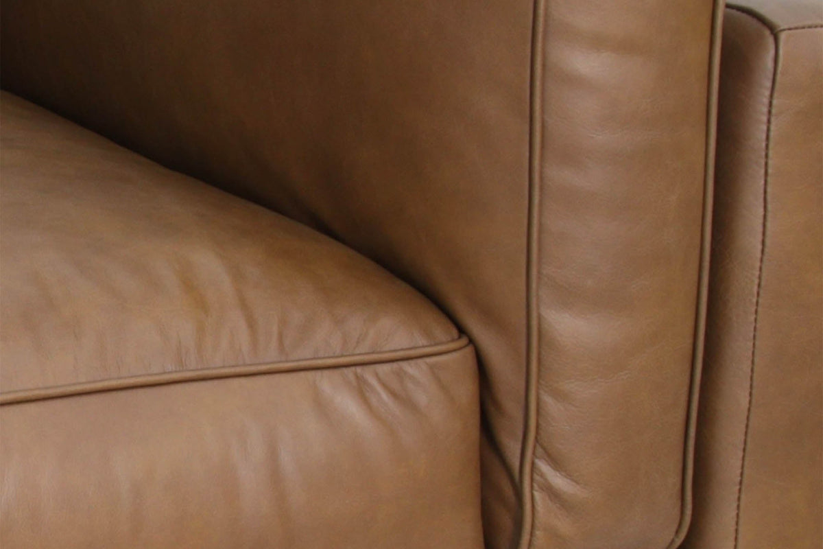 Close-up of Thatcher seat and back cushions in Antique Sienna top-grain leather