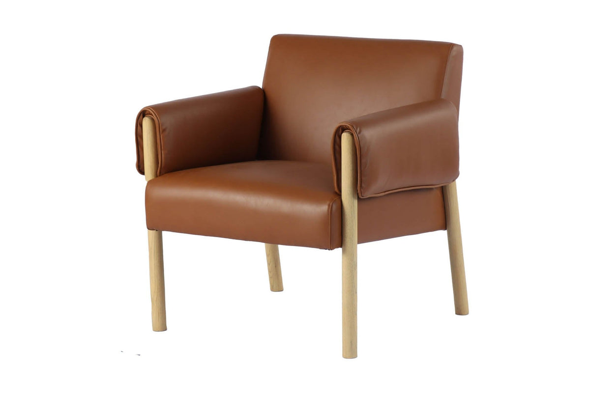 Upton saddle faux leather accent chair with natural ash legs, three-quarter view