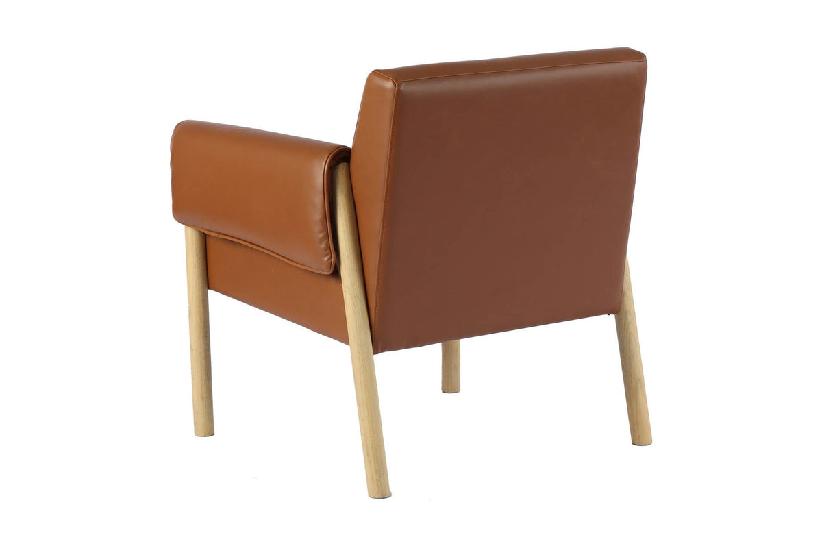 Upton saddle faux leather accent chair, rear three-quarter view
