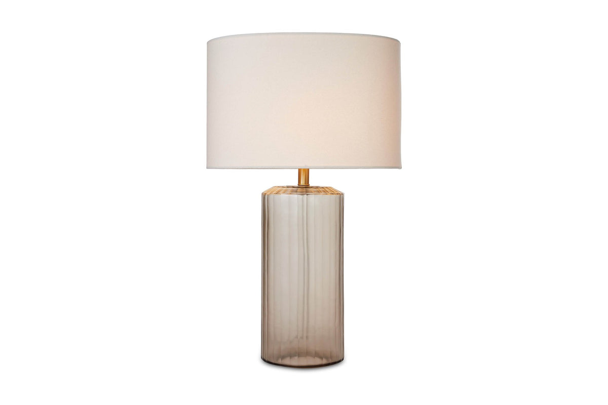 Valeria table lamp switched on, with the cotton shade lit
