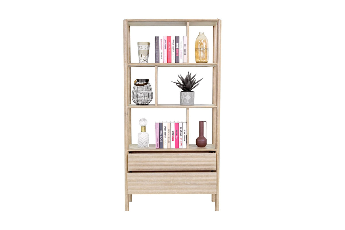 Vesper bookcase styled with books, vases and a plant