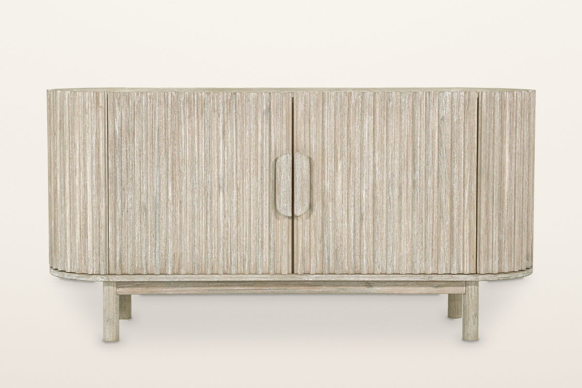 Vitorchiano sideboard from the front: two reeded doors meeting at one split oval pull, curved reeded end doors, the oval plinth and four round legs