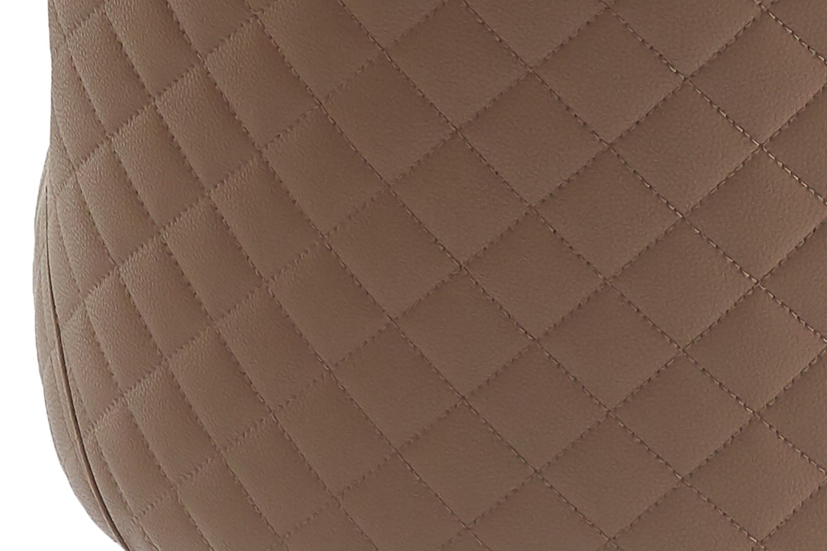 Wilkes dining chair close-up of the diamond-pattern stitching in brown faux leather