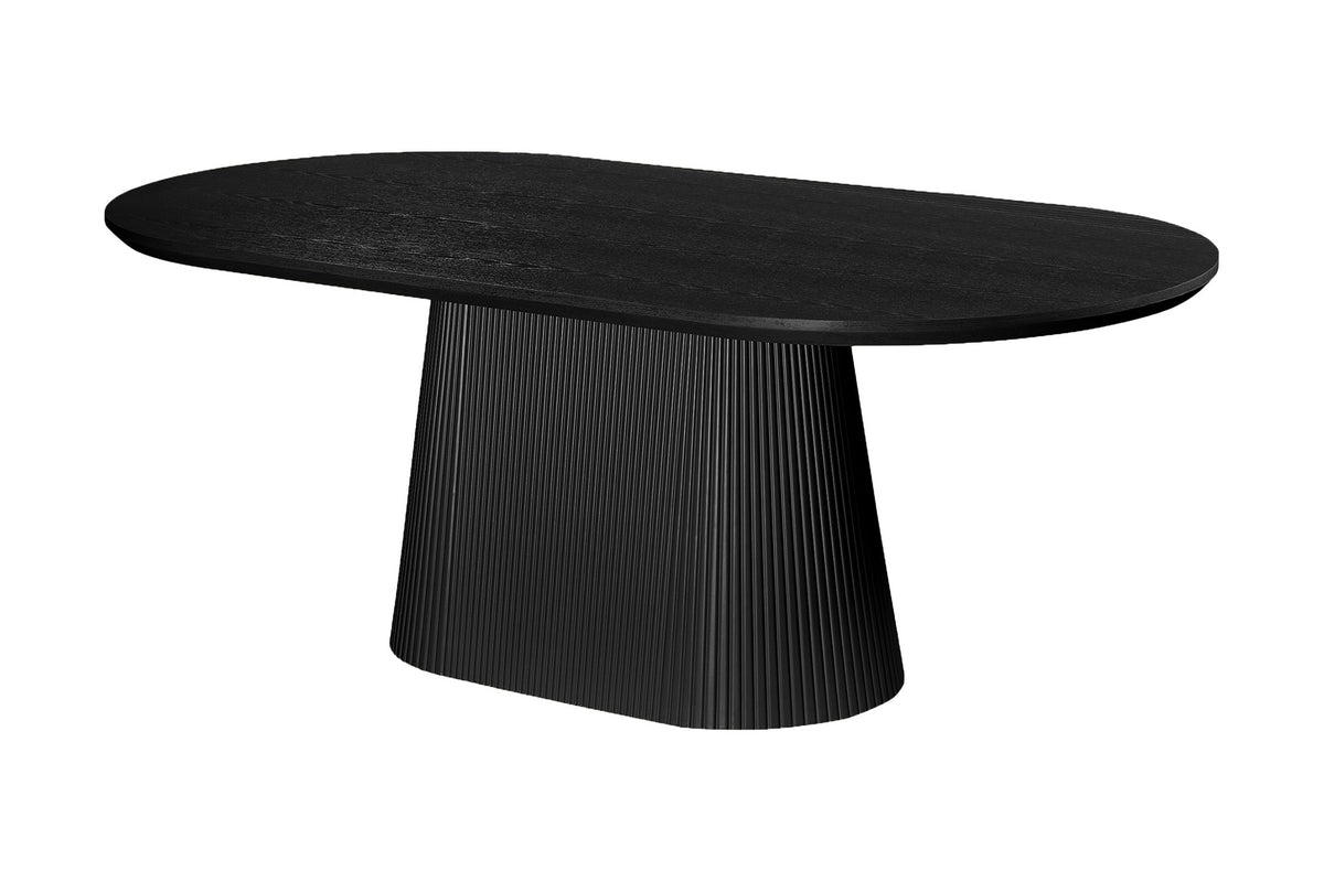 Yale black oval dining table with reeded pedestal base, three-quarter view