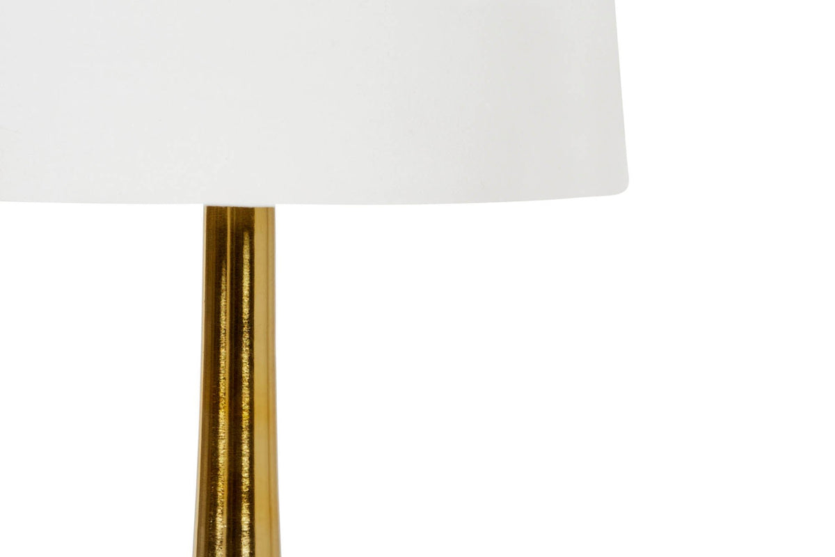 Close-up of the linen shade and antique brass stem on the Yvette floor lamp