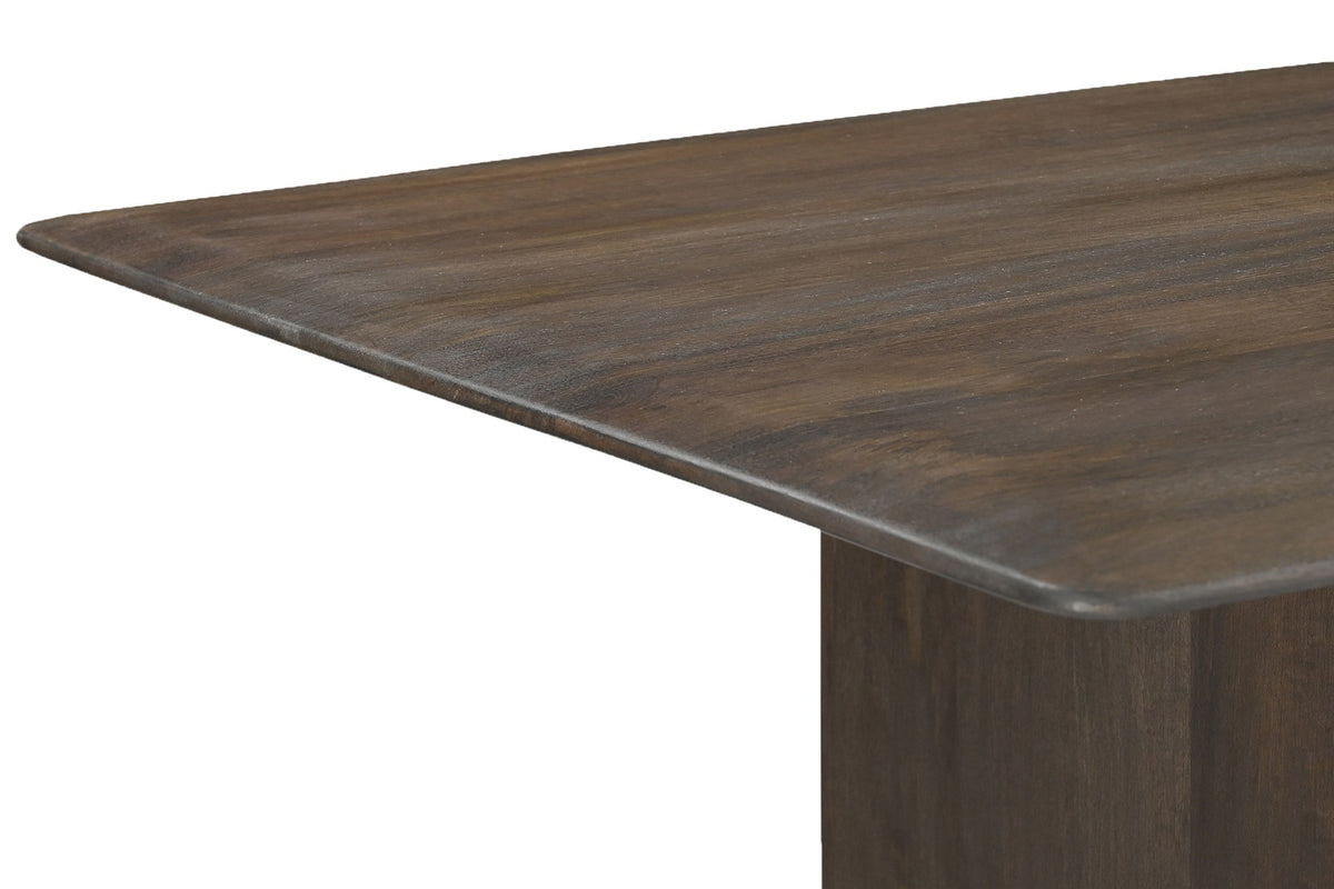 Close-up of the rounded edge on the Zane solid mango wood table top