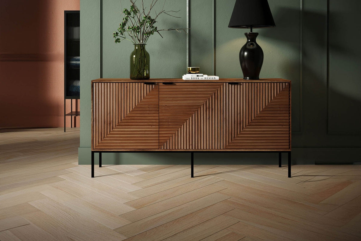 Zephyr sideboard with angled fluted doors against a green panelled wall