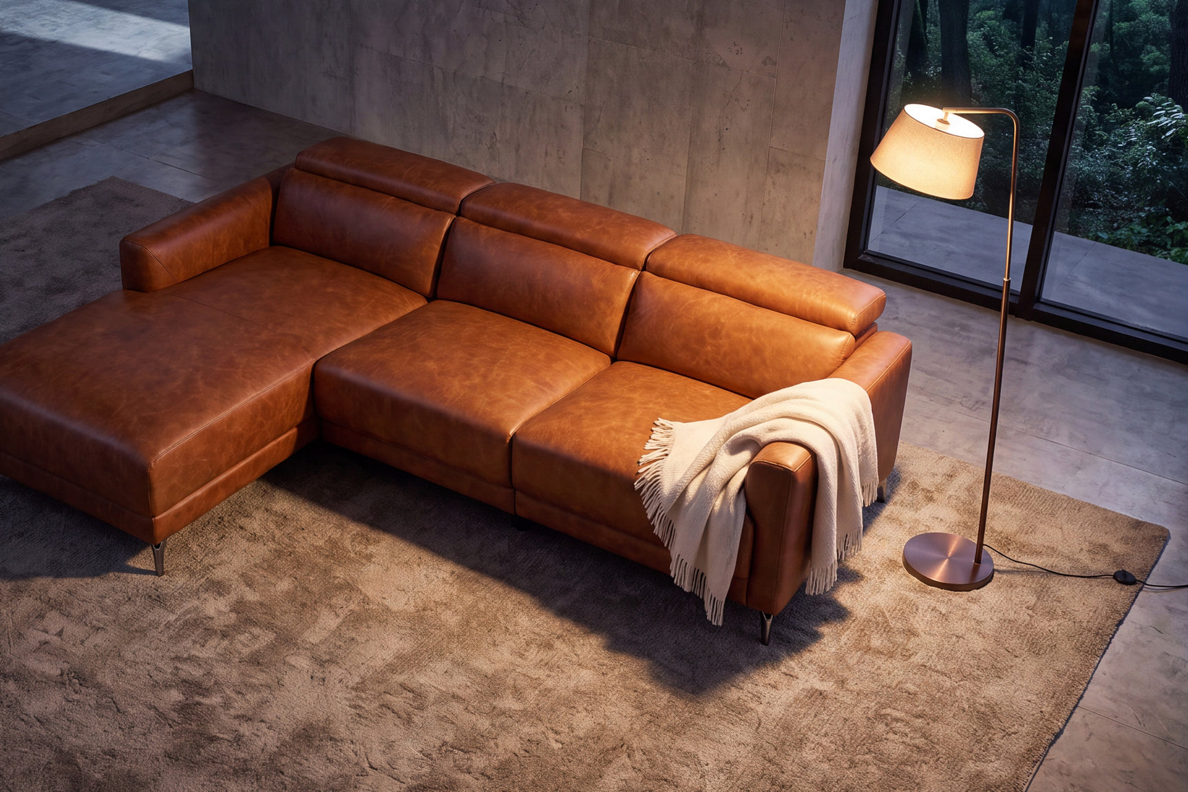 Overhead view of the Andria cognac leather sectional with left-facing chaise in a contemporary room