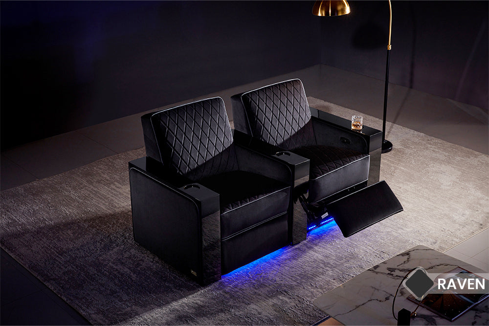 In A Living Room, There is Left Angled Front Top View of A Luxurious, Raven, Two Seats, Piano Black Wood Frame, Naples Prestige Italian Leather Chair.
