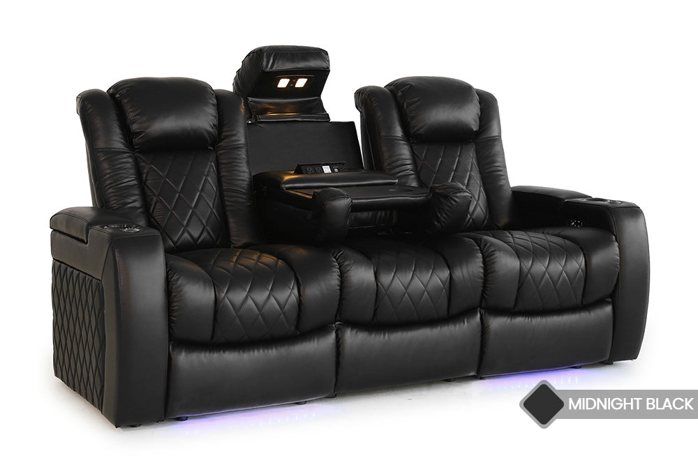 In a White Background, There is Left Angled Front View of A Luxurious, Midnight Black, Wood and Steel Frame, Tuscany Premium Top Grain Nappa Leather Console Edition Home Theater Seating.