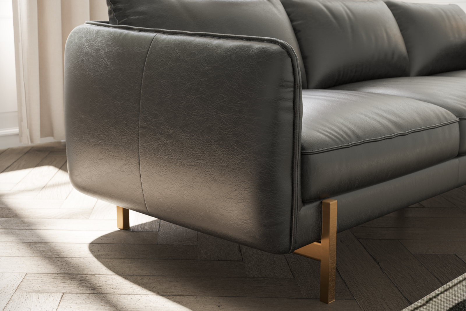 Left-Side, Closeup Armrest and Seat view of a Gabriele Leather Sofa in a Living Room