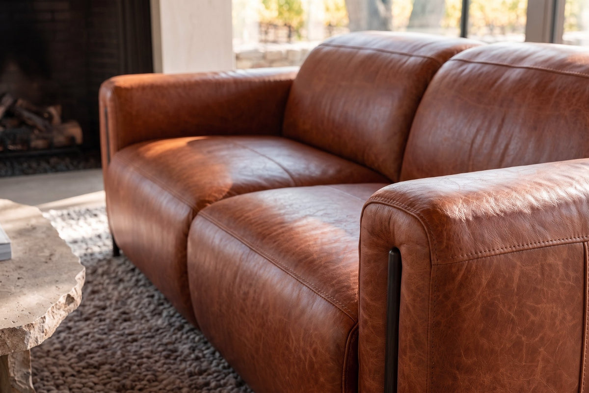 Octavia dual Reclining Sofa in distressed Italian aniline leather