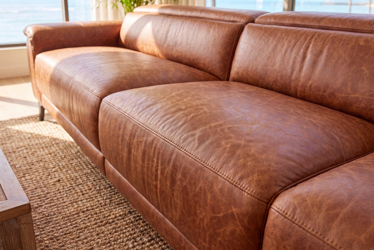 Pista reclining chaise sectional in Tuscan Cognac distressed Italian aniline leather, right chaise configuration