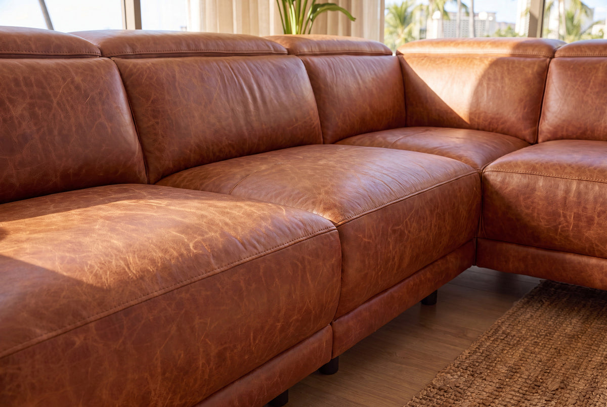 Pista reclining chaise sectional in Tuscan Cognac distressed Italian aniline leather, right chaise configuration