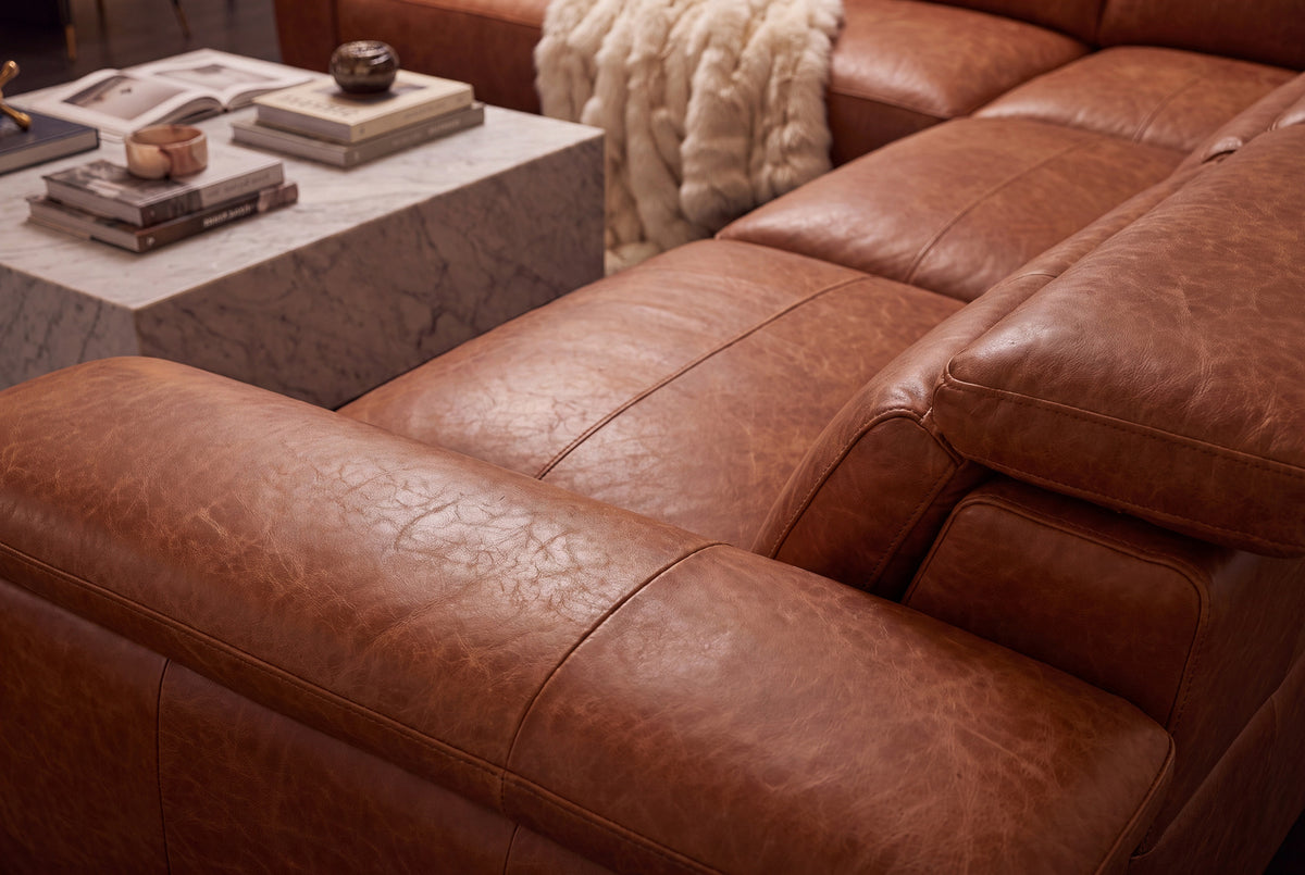 Pista reclining chaise sectional in Tuscan Cognac distressed Italian aniline leather, right chaise configuration