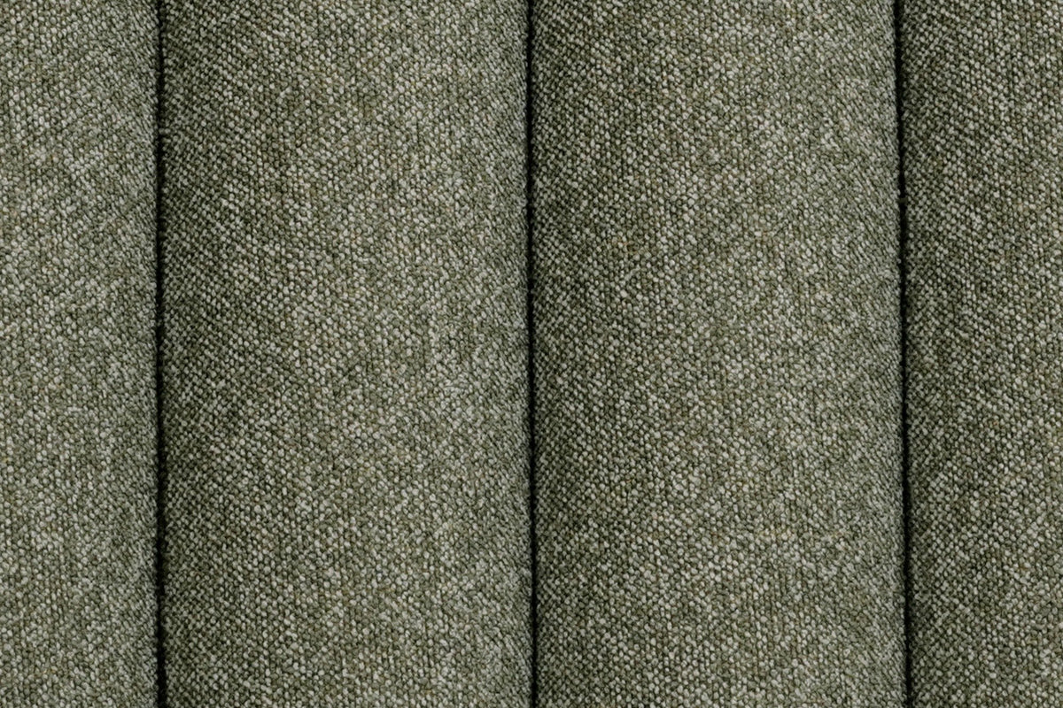 Close-up of the Abbadia channels in moss: deep grooves between rounded rolls of flecked textured fabric