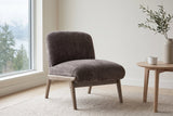 Acquasparta accent chair in dark taupe velvet in a bright Vancouver living room