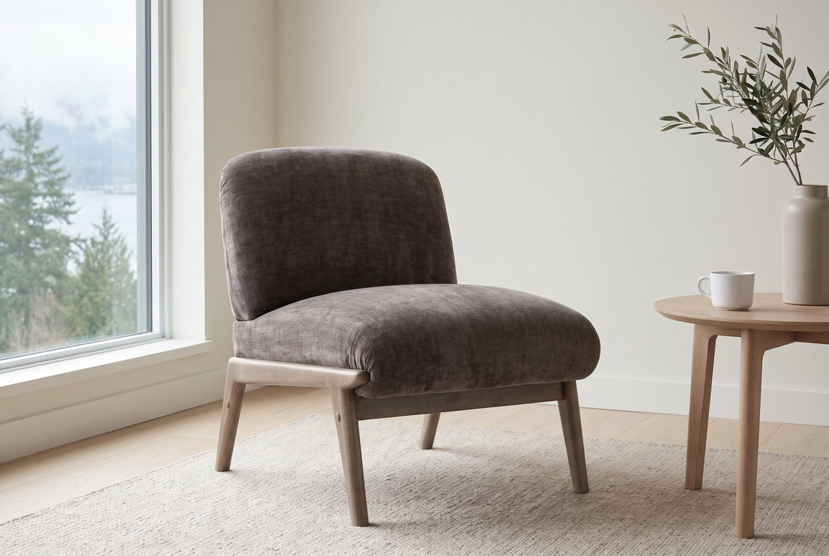 Acquasparta accent chair in dark taupe velvet in a bright Vancouver living room