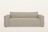 Agerola sofa in Sand from the front: two wide track arms, a single bench seat and one long back cushion