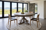 Aggius round dining table seen from above in a St. Andrews by-the-Sea house