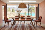 Amandola dining table in Light Walnut in an Osoyoos desert house with terracotta plaster walls