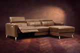 The Andria power reclining sectional on a walnut herringbone floor with the arm-end power recliner open: its two-tier footrest out and its headrest raised. Shown in Weathered Saddle, Right chaise.