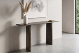 Anghiari console table in mocha in a pale West Coast entry in Vancouver, a white vase of pampas grass and a brass dish on top