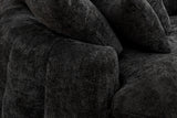 Close-up of a squared arm end and the plump vertical channels in black chenille