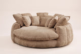 Aosta oversized round lounge chair in coffee chenille, three-quarter view on a warm off-white backdrop