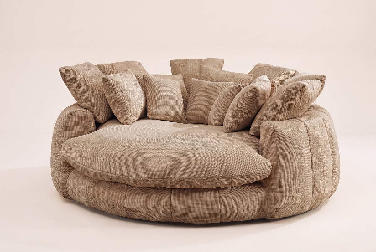 Aosta oversized round lounge chair in coffee chenille, three-quarter view on a warm off-white backdrop