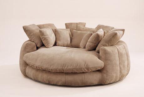 Aosta oversized round lounge chair in coffee chenille, three-quarter view on a warm off-white backdrop