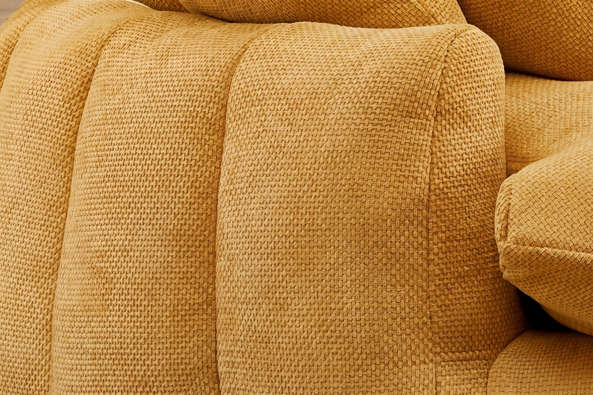Close-up of a squared arm end and the plump vertical channels in yellow chenille