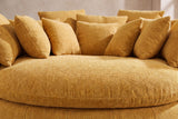 Close-up of the thick round seat cushion in yellow basket-weave chenille, square pillows behind