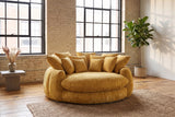 Aosta lounge chair on a jute rug in a Montreal loft with pale brick walls and steel factory windows (Yellow)