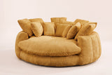Aosta oversized round lounge chair in yellow chenille, three-quarter view on a warm off-white backdrop