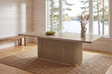 Aquileia dining table in Natural in a whitewashed Muskoka cottage dining room with a window onto the lake