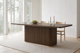 Aquileia dining table in a bright Vancouver dining room on a foggy morning, a bowl of pears and two candles on top