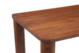Close-up of an Arcevia corner in Brown: the rounded corner and eased edge of the mango top over two round legs