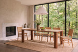 Arcevia dining table in Brown in an Ottawa Rockcliffe Park house with a white marble fireplace