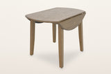 Arden drop-leaf dining table in Walnut with both leaves folded down, the top 26 in across, the leaves hanging on their hinges